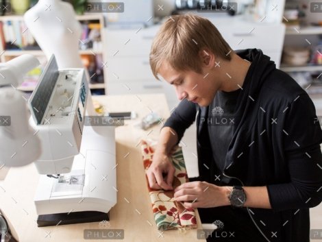 demo-attachment-556-fashion-designer-with-making-dress-at-studio-P75Z6LP